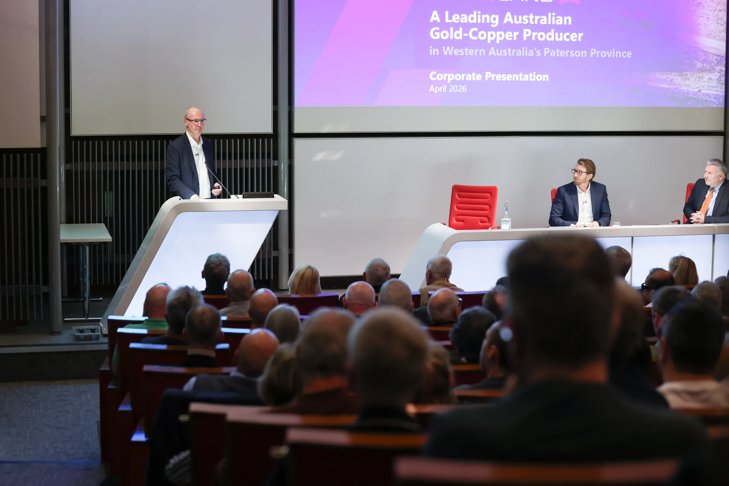 Greatland Resources speaker at the podium during the in-person town hall