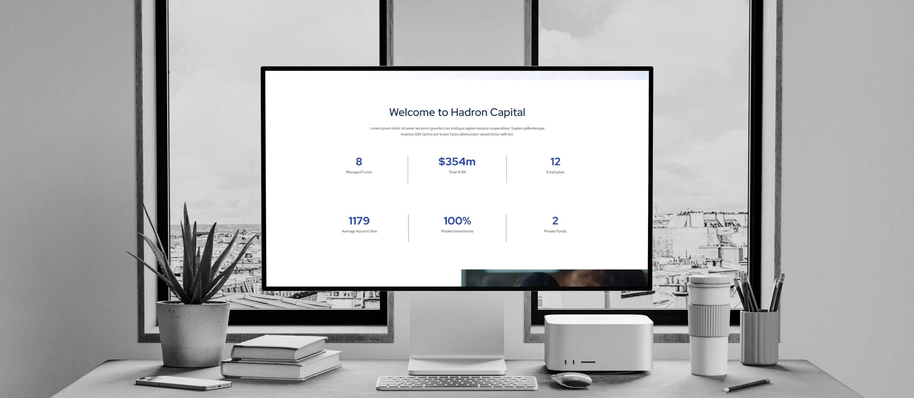 Hadron Capital website on desktop monitor